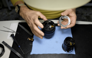 Repairs being performed on camera lens